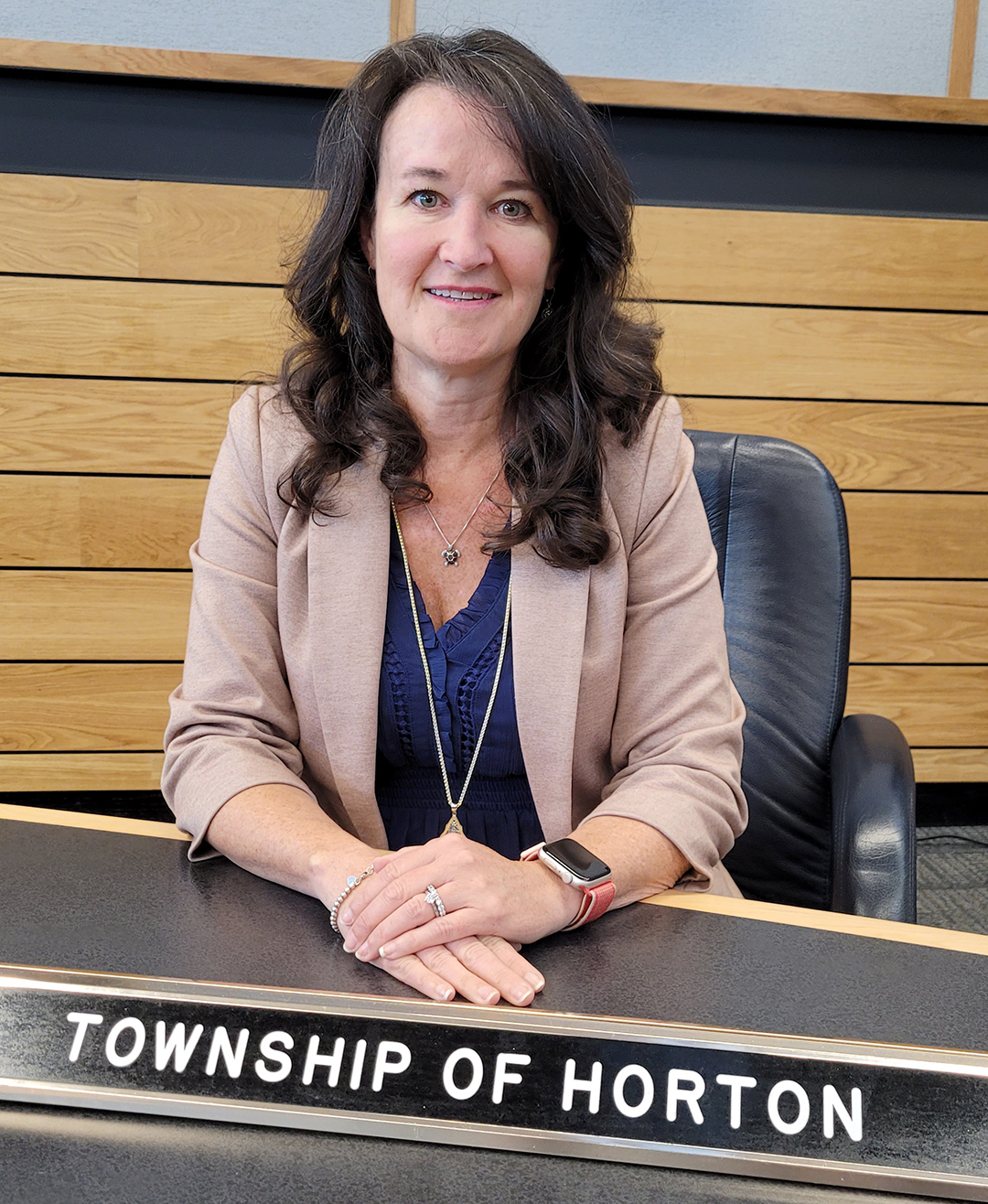 Councillor Daina Proctor - woman sitting at a desk with a name plate in front Township of Horton
