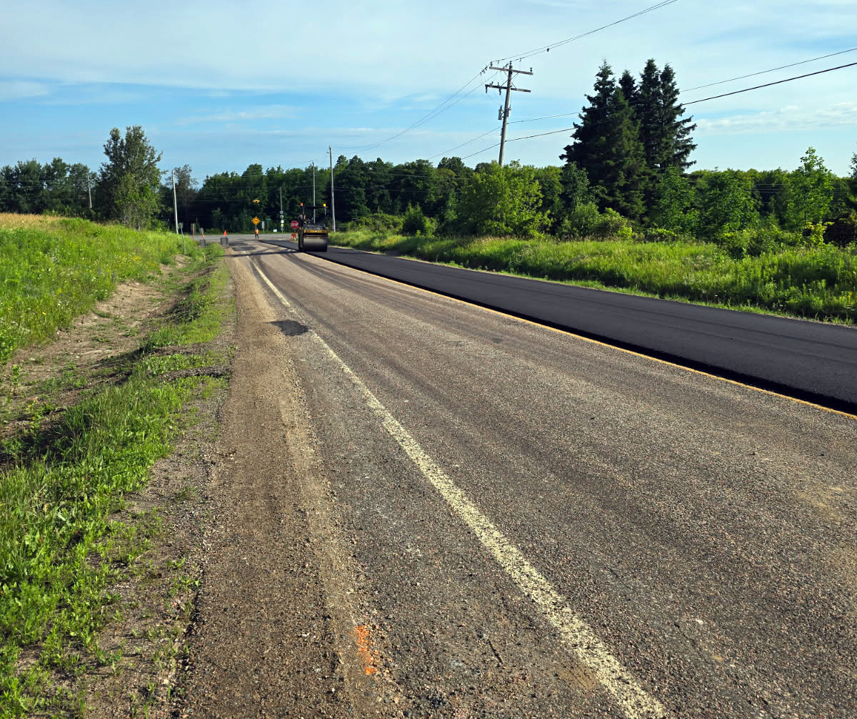 road construction - a roller paving in the distance