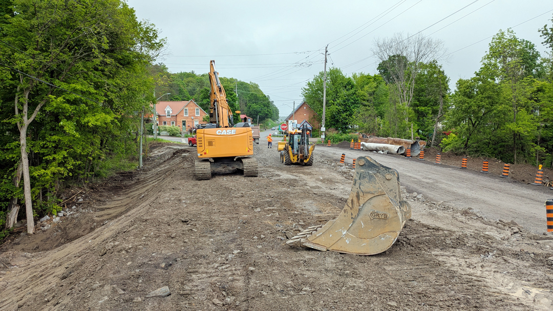 Construction equipment working to replace a culvert