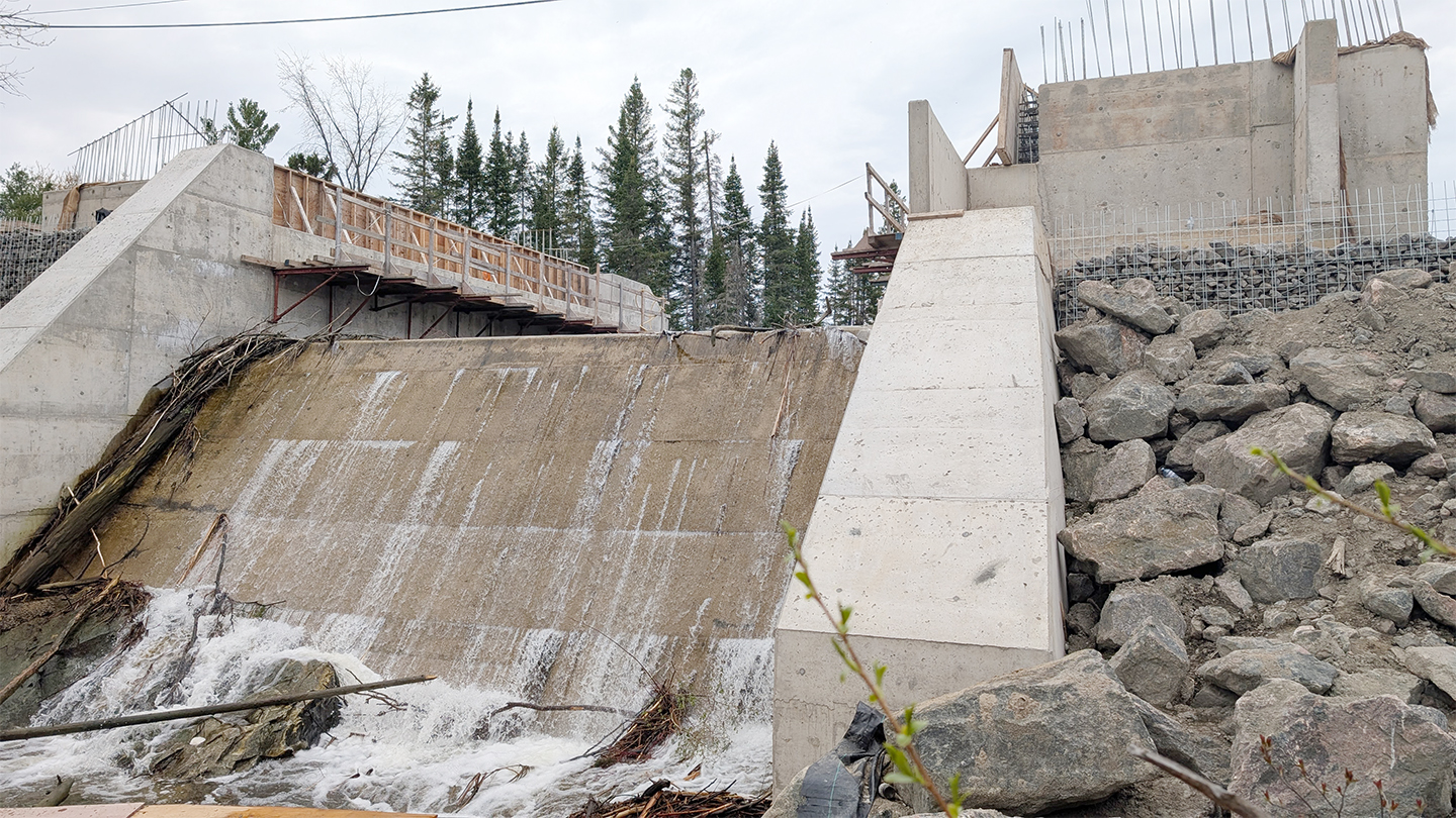 photo of a dam being reconstructed