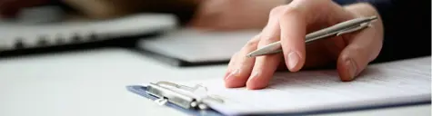Hand-completing-a-form.jpg